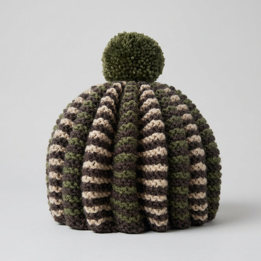 A hand knitted tea cosy
